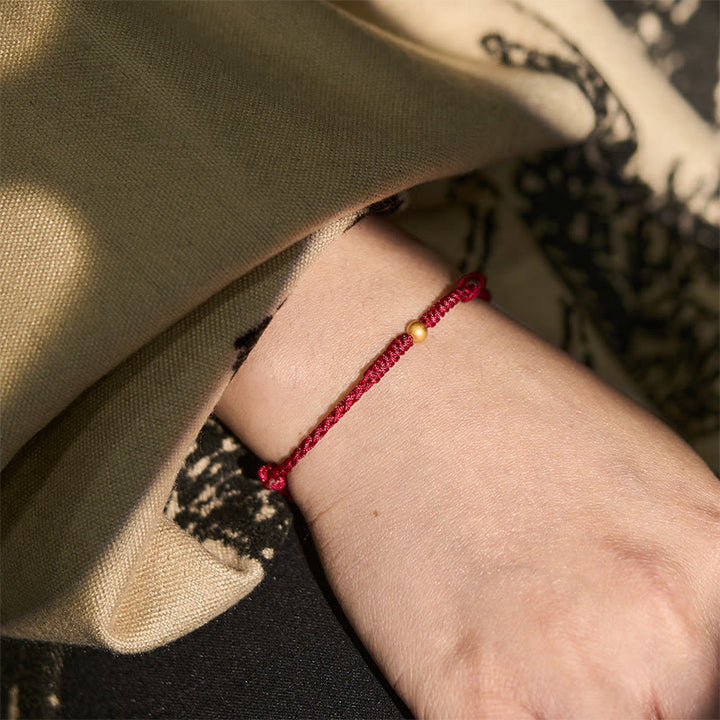 Bracelet de cheville en corde rouge tressée, plaqué or et orné d'une seule perle , Buddha Stones - image 6
