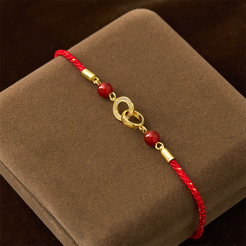 Bracelet de protection en cuivre plaqué or avec boucles de paix et Buddha Stones reliées par un cordon rouge - image 2