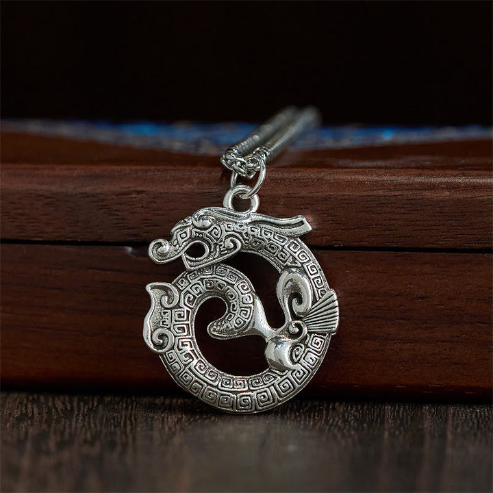 Collier pendentif en argent plaqué cuivre représentant un dragon enroulé tibétain en Buddha Stones - image 1