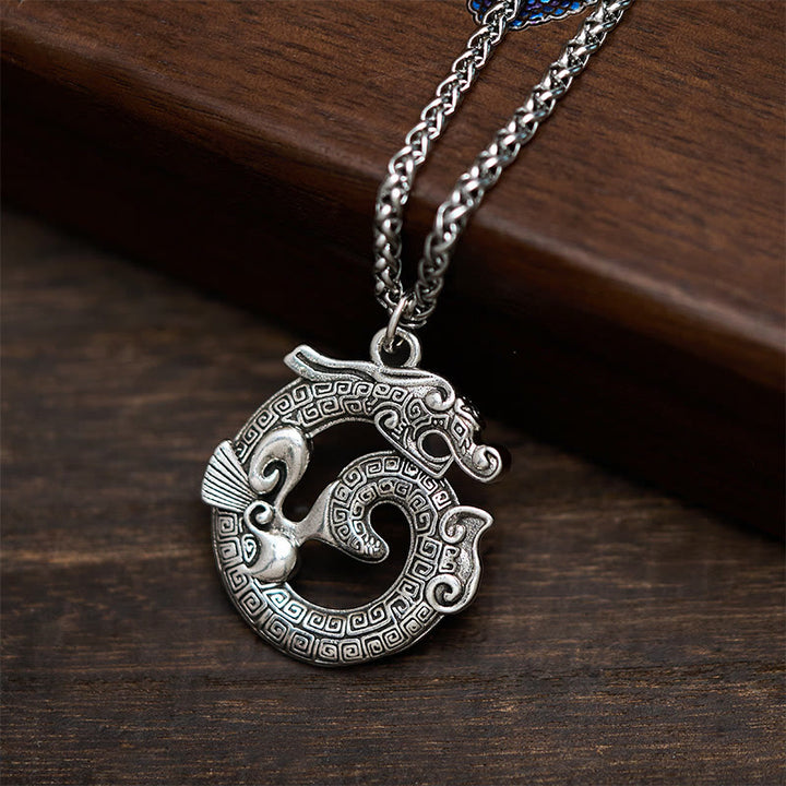 Collier pendentif en argent plaqué cuivre représentant un dragon enroulé tibétain en Buddha Stones - Dragon enroulé - image 0