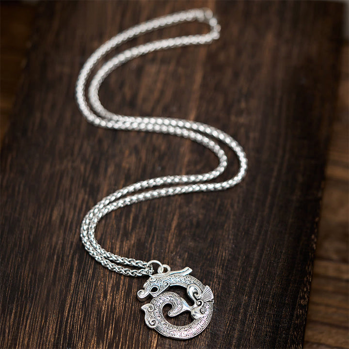 Collier pendentif en argent plaqué cuivre représentant un dragon enroulé tibétain en Buddha Stones - image 4