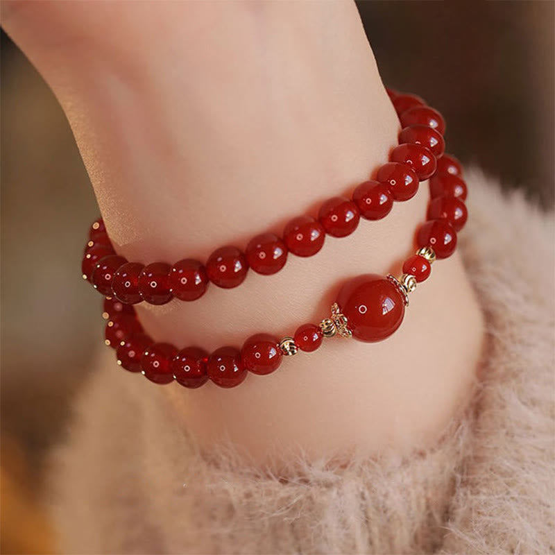 Bracelet de confiance et d'acceptation de soi en perles d'agate rouge à double tour de Buddha Stones - image 0