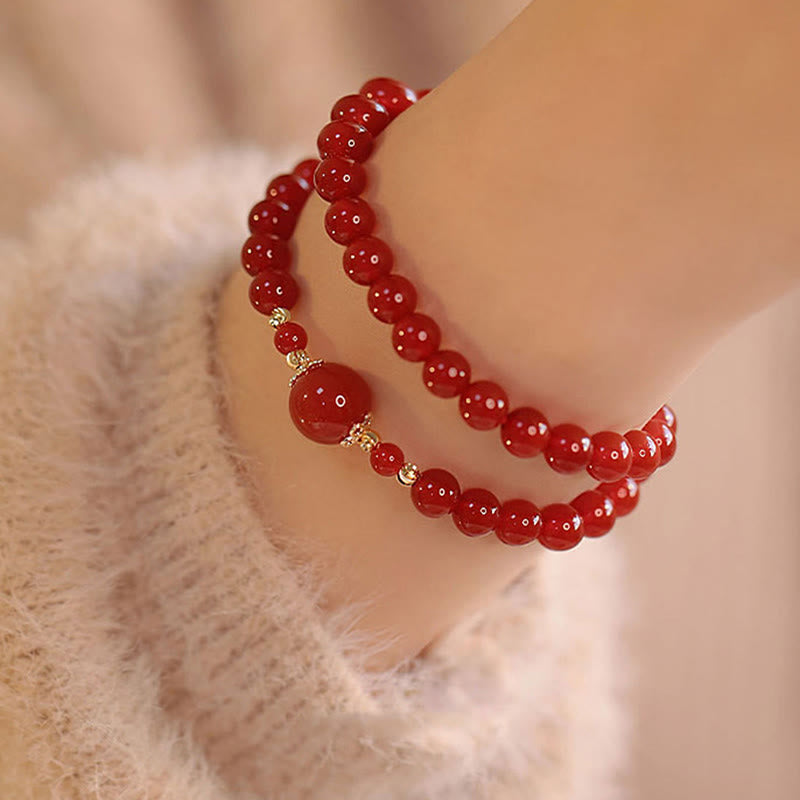 Bracelet de confiance et d'acceptation de soi en perles d'agate rouge à double tour de Buddha Stones - image 2