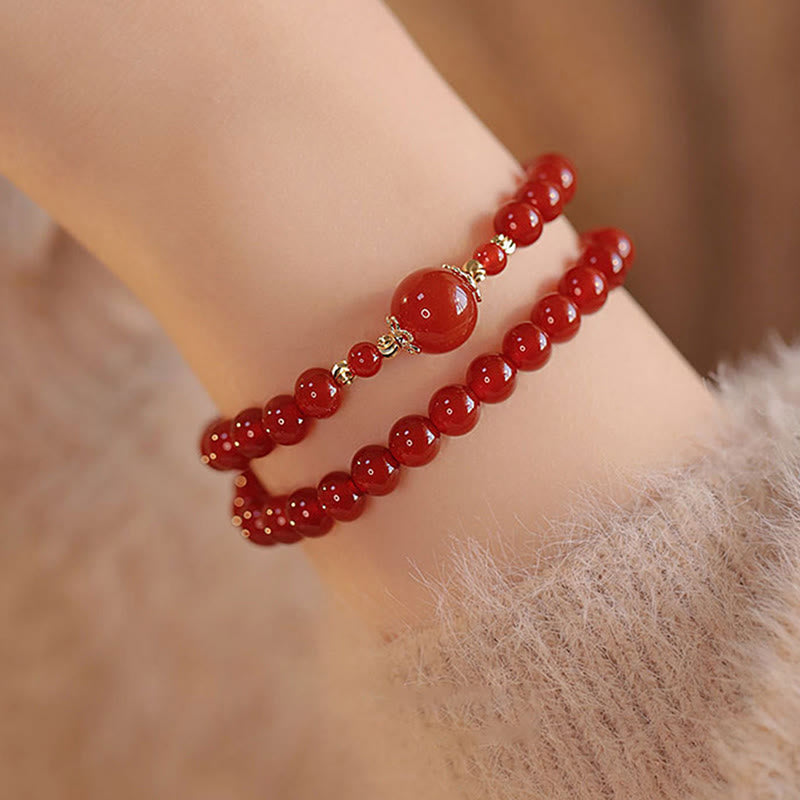 Bracelet de confiance et d'acceptation de soi en perles d'agate rouge à double tour de Buddha Stones - image 3