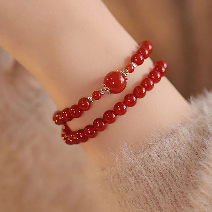 Bracelet de confiance et d'acceptation de soi en perles d'agate rouge à double tour de Buddha Stones - image 3