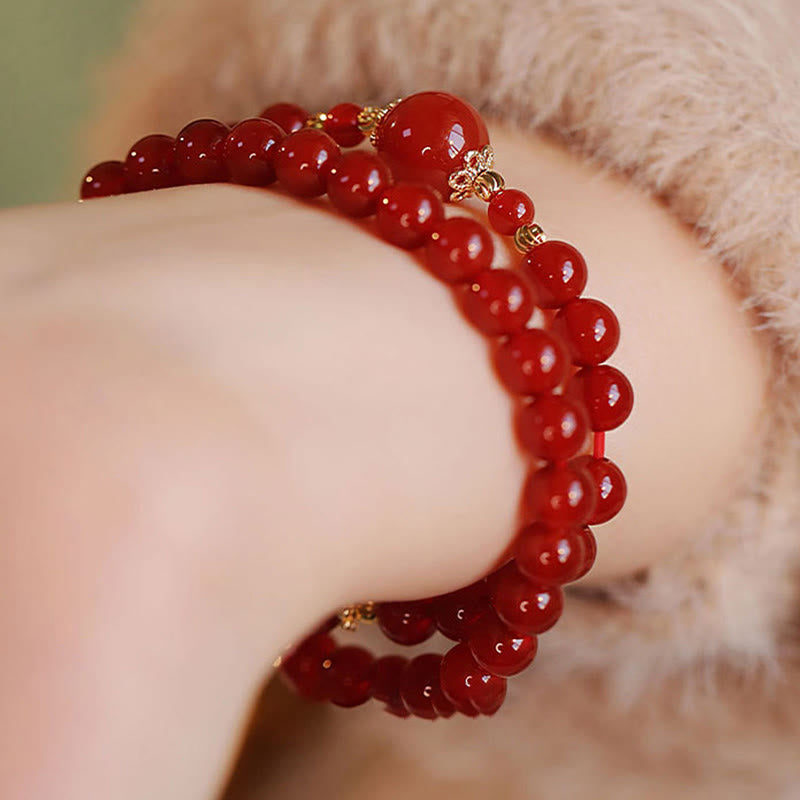 Bracelet de confiance et d'acceptation de soi en perles d'agate rouge à double tour de Buddha Stones - image 9