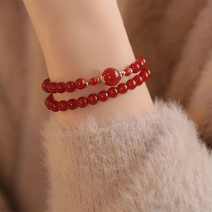 Bracelet de confiance et d'acceptation de soi en perles d'agate rouge à double tour de Buddha Stones - image 4