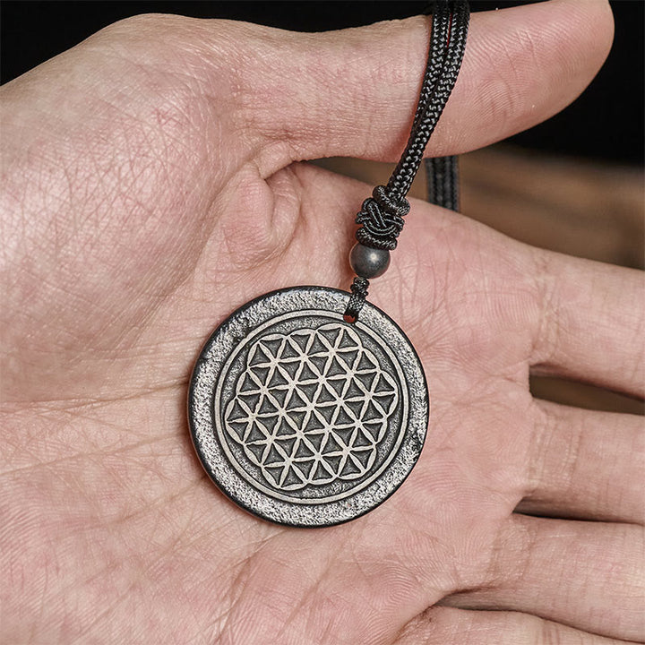 Collier pendentif en Buddha Stones, motif Fleur de Vie, sculpté dans une authentique pierre de shungite, symbole de protection. - image 5