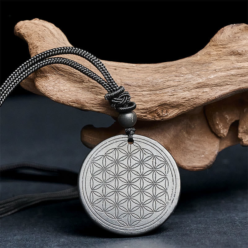 Collier pendentif en Buddha Stones, motif Fleur de Vie, sculpté dans une authentique pierre de shungite, symbole de protection. - image 10