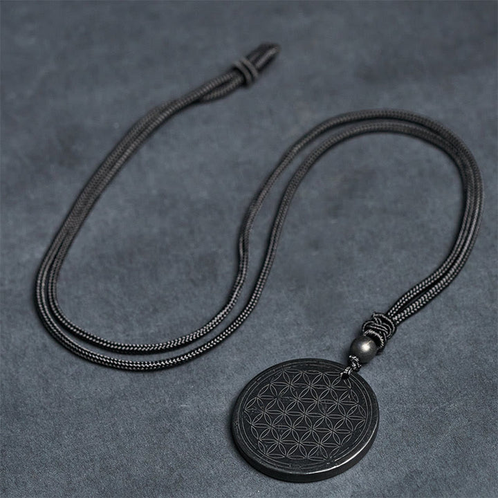 Collier pendentif en Buddha Stones, motif Fleur de Vie, sculpté dans une authentique pierre de shungite, symbole de protection. - image 14