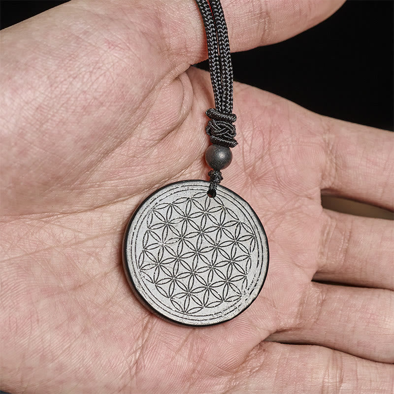 Collier pendentif en Buddha Stones, motif Fleur de Vie, sculpté dans une authentique pierre de shungite, symbole de protection. - image 12