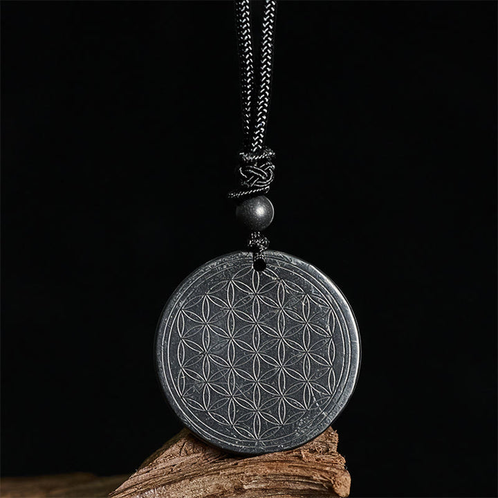 Collier pendentif en Buddha Stones, motif Fleur de Vie, sculpté dans une authentique pierre de shungite, symbole de protection. - image 11