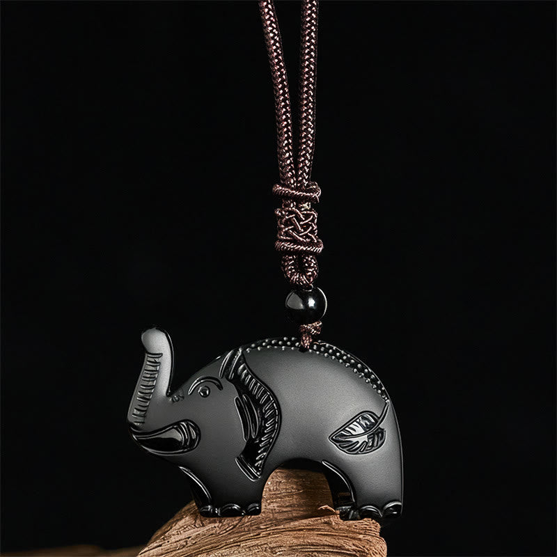 Pendentif en obsidienne noire sculptée, orné d'un éléphant et représentant la force, inspiré des Buddha Stones. Collier avec pendentif - image 2