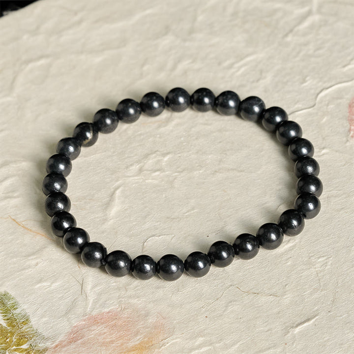 Bracelet de Buddha Stones, symbole de force intérieure - 6 mm - image 1