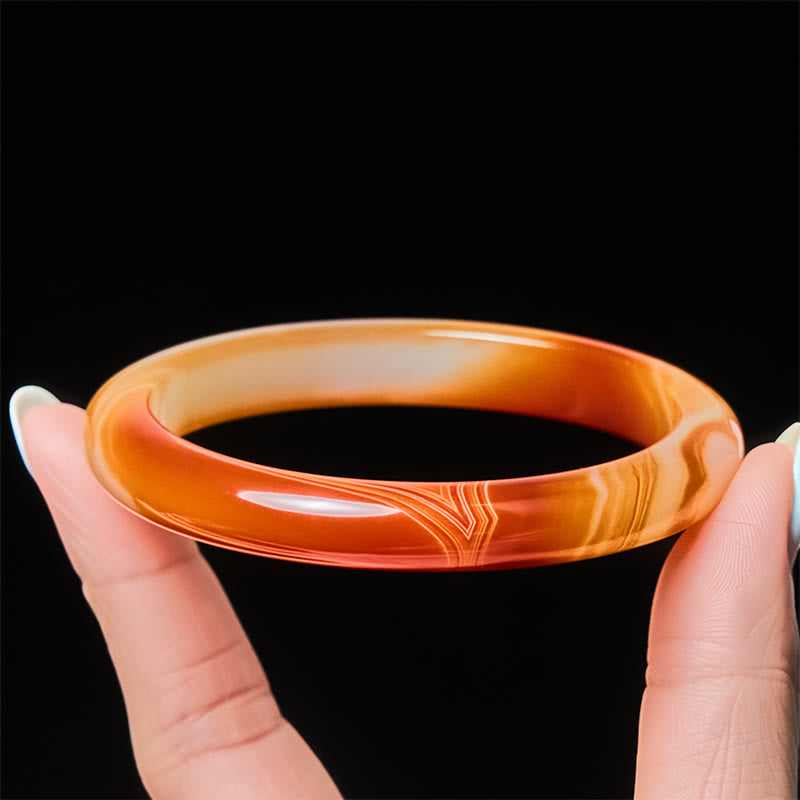 Bracelet jonc apaisant en agate rouge veinée de Buddha Stones - image 3