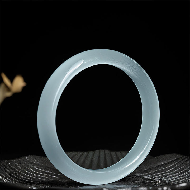 Bracelet jonc spirituel en Buddha Stones œil-de-chat blanc, symbole d'abondance et de spiritualité - image 2