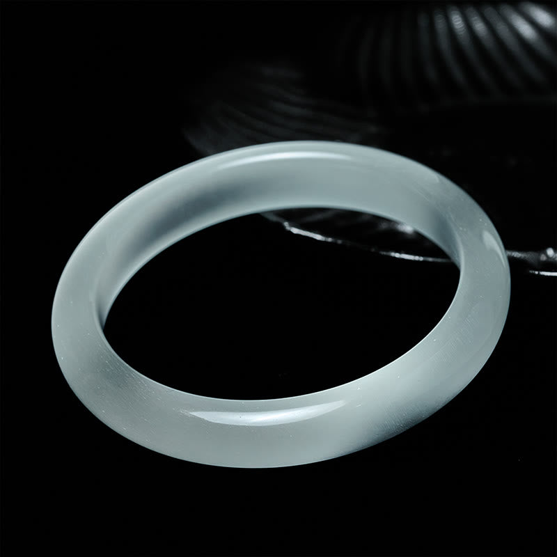 Bracelet jonc spirituel en Buddha Stones œil-de-chat blanc, symbole d'abondance et de spiritualité - image 1