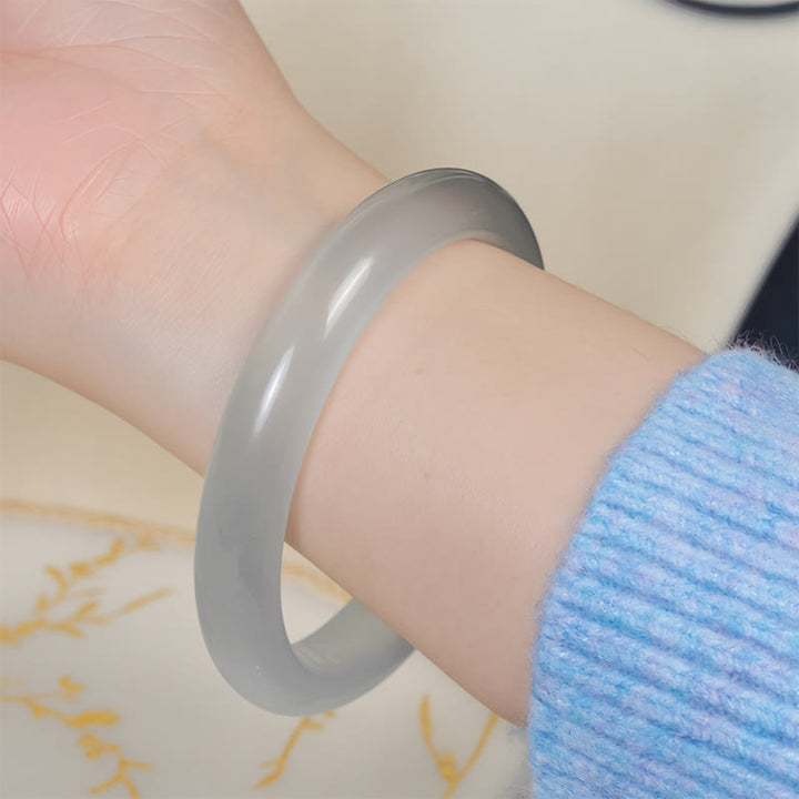 Bracelet jonc spirituel en Buddha Stones œil-de-chat blanc, symbole d'abondance et de spiritualité - image 4