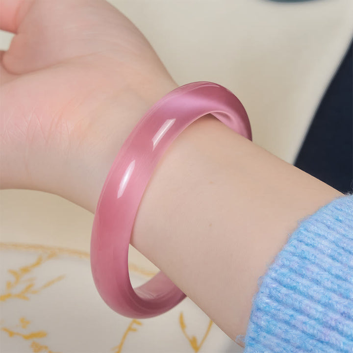 Bracelet jonc de paix et d'amour en pierre œil-de-chat rose et Buddha Stones - image 4