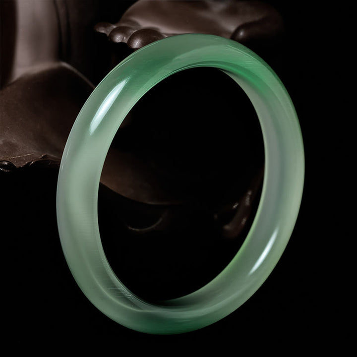 Bracelet jonc fin de soutien à la paix en chrysobéryl œil de chat et Buddha Stones - image 1