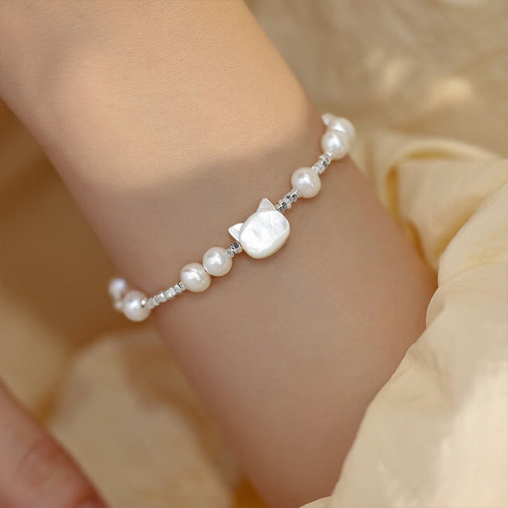 Bracelet de guérison en argent avec chaîne en pierre Tridacna et tête de chat en Buddha Stones - Perle (Tour de poignet 14-16 cm) - image 0