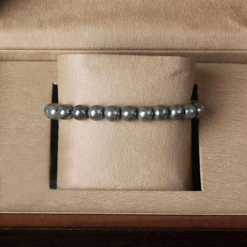 Bracelet de perles rondes en pyrite et Buddha Stones, symbole de confiance et d'abondance - image 1