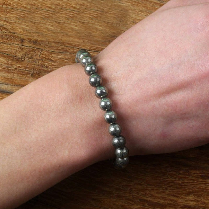 Bracelet de perles rondes en pyrite et Buddha Stones, symbole de confiance et d'abondance - image 2