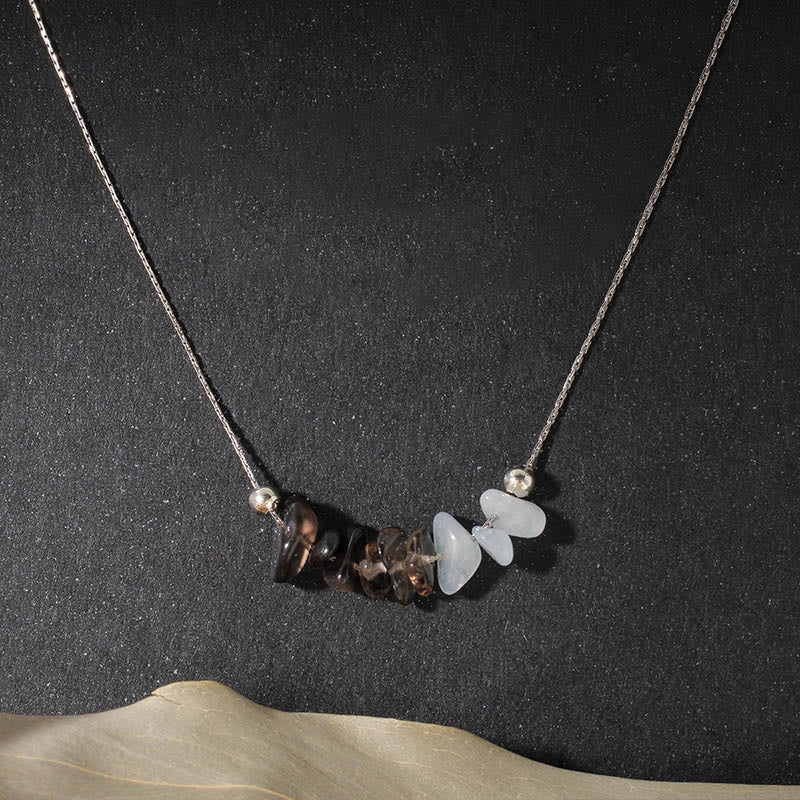 Collier pendentif en cristal rose, orbidine noire, quartz fumé, grenat, aigue-marine et quartz fraise, orné de Buddha Stones et symbole de force. - Obsidienne noire, quartz fumé, aigue-marine - image 0