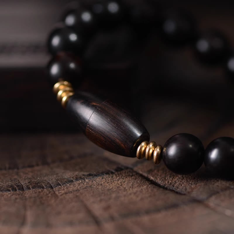 Bracelet de protection en perles d'ébène et Buddha Stones, orné d'un parchemin de sutra et symbole de bénédiction. - image 7