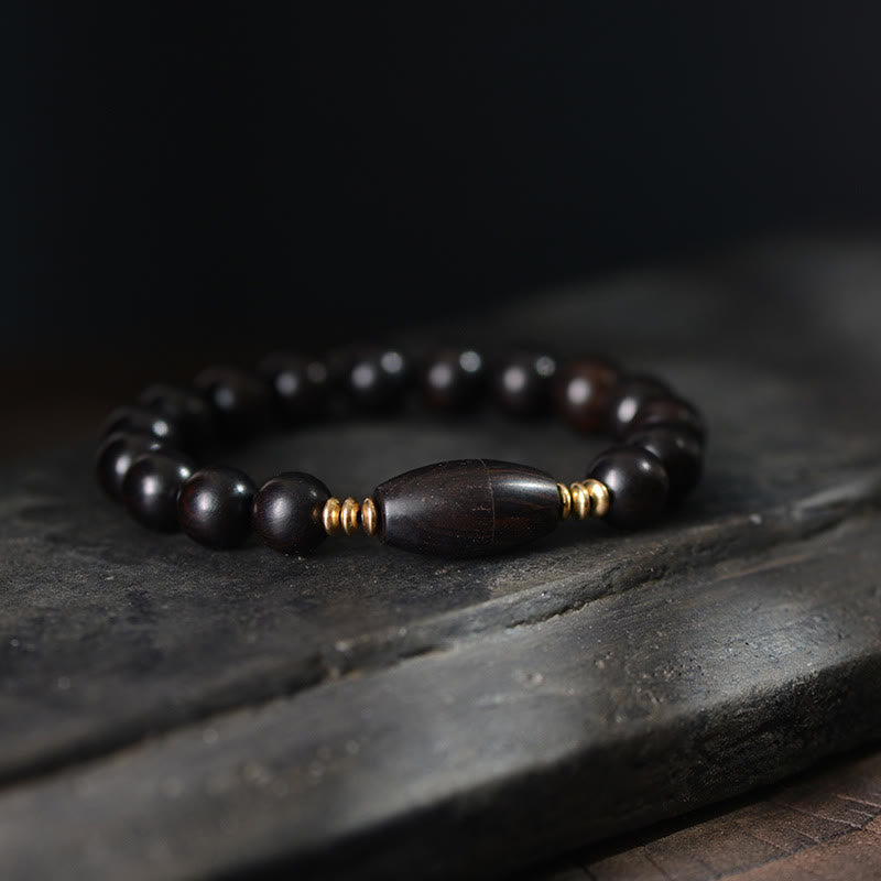 Bracelet de protection en perles d'ébène et Buddha Stones, orné d'un parchemin de sutra et symbole de bénédiction. - 18-19 cm - image 2
