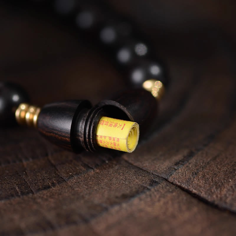 Bracelet de protection en perles d'ébène et Buddha Stones, orné d'un parchemin de sutra et symbole de bénédiction. - image 8