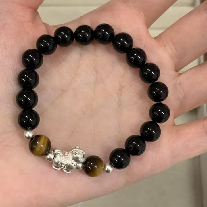Bracelet de force en argent sterling 999 avec breloque cheval en obsidienne noire et œil de tigre , Buddha Stones , année du Cheval - 10 mm - image 0