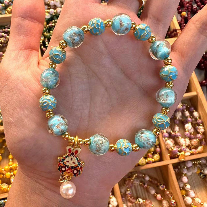 Bracelet porte-bonheur en verre Liuli avec lapin et Buddha Stones - Verre Liuli (Tour de poignet : 15-16 cm) - image 0