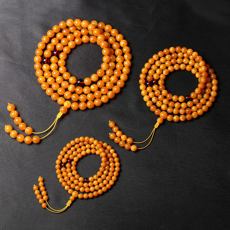 Mala de perles rondes en ambre tibétain et Buddha Stones - 10 mm - image 1