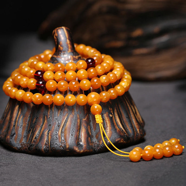 Mala de perles rondes en ambre tibétain et Buddha Stones - image 2