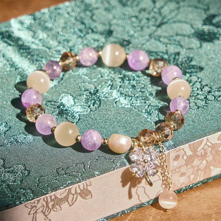 Bracelet d'équilibre en Buddha Stones, trèfle à quatre feuilles, améthyste, citrine, quartz fraise vert, quartz rutile et quartz rutile. - image 2