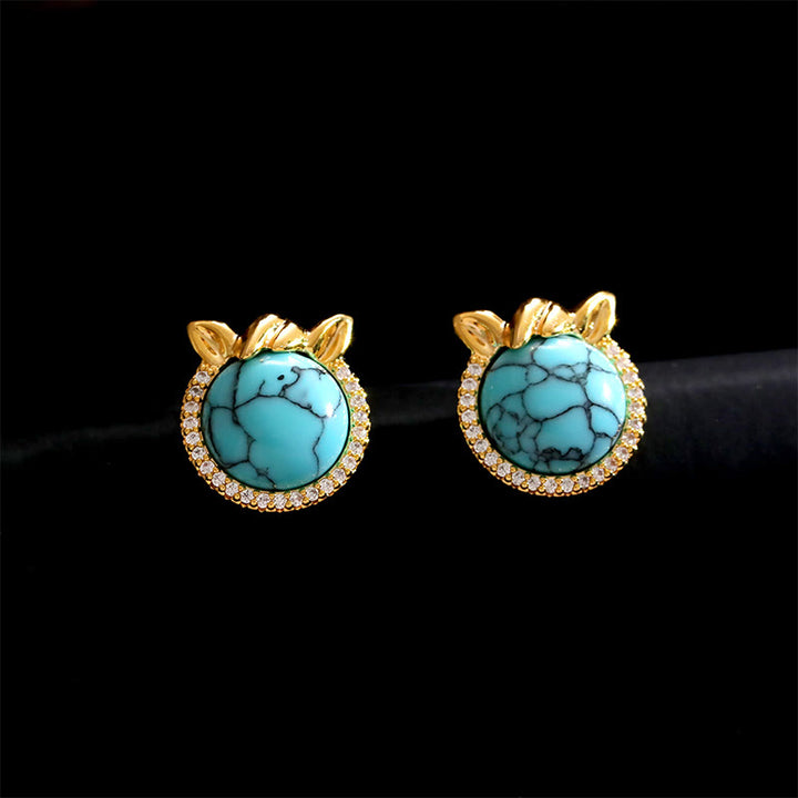 Boucles d'oreilles équilibre en cuivre turquoise et Buddha Stones, en forme d'oreille de cheval - image 1
