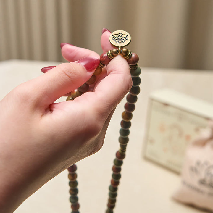 Mala chaude en perles rondes, turquoise rouge, avec pendentif lotus rétro en Buddha Stones - image 4