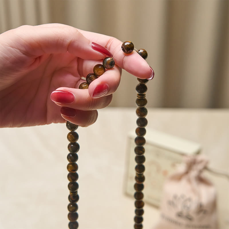 Mala de force en Buddha Stones, symbole du lotus et œil de tigre - image 4