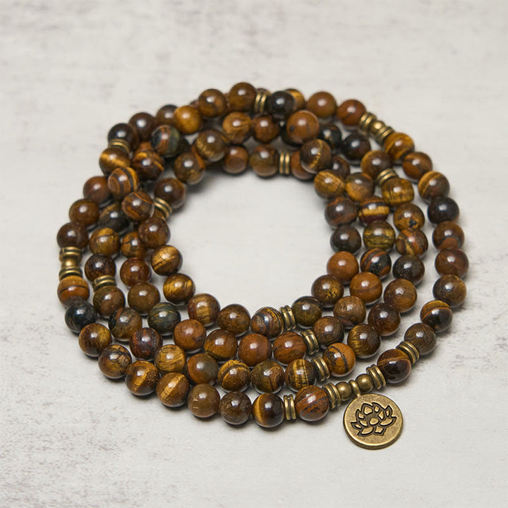 Mala de force en Buddha Stones, symbole du lotus et œil de tigre - image 1