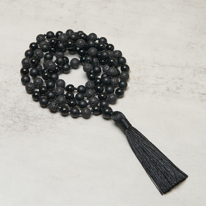 Buddha Stones, onyx noir, pierre de lave, pompon, mala de protection et de fortune - Onyx noir et roche de lave - image 0