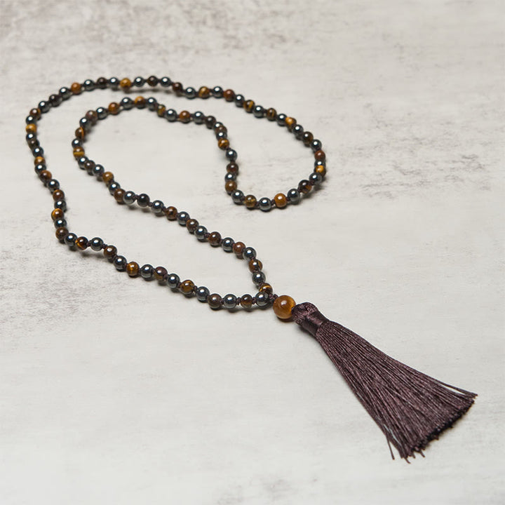 Mala de 108 Buddha Stones , œil de tigre et hématite, avec pompon, symbole de courage et de force - image 2