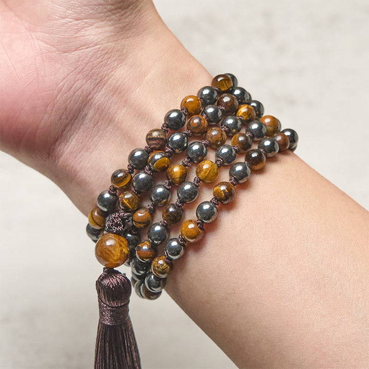 Mala de 108 Buddha Stones , œil de tigre et hématite, avec pompon, symbole de courage et de force - image 3