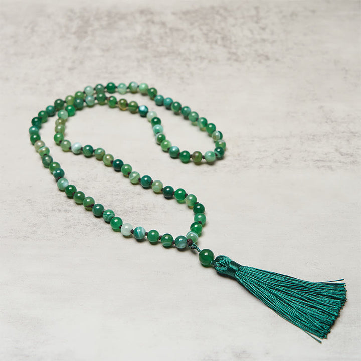 Bracelet de protection en Buddha Stones et pompon en malachite - image 2