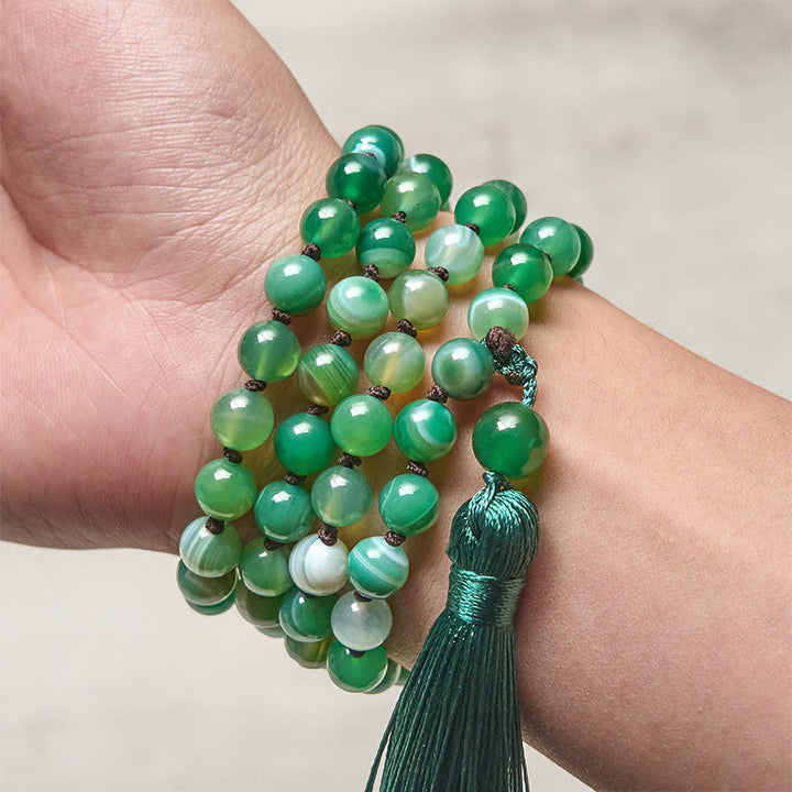 Bracelet de protection en Buddha Stones et pompon en malachite - image 3