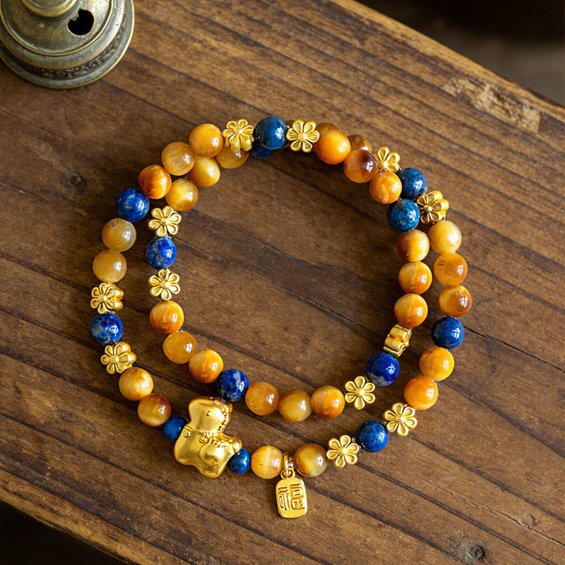 Bracelet double tour Sérénité en lazurite, lapis-lazuli et œil de tigre, orné de Buddha Stones et représentant le personnage Fu de l'année du Cheval. - image 3
