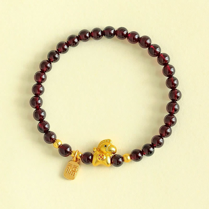 Bracelet de protection en grenat de l'année du Cheval, orné de Buddha Stones et du caractère Fu - image 1