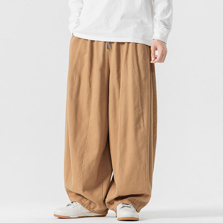 Pantalon en coton à jambes larges avec poches, motif Buddha Stones, idéal pour les trajets d'hiver. - image 9