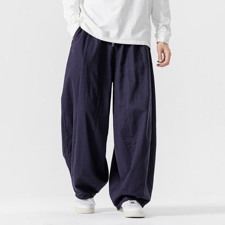 Pantalon en coton à jambes larges avec poches, motif Buddha Stones, idéal pour les trajets d'hiver. - image 0