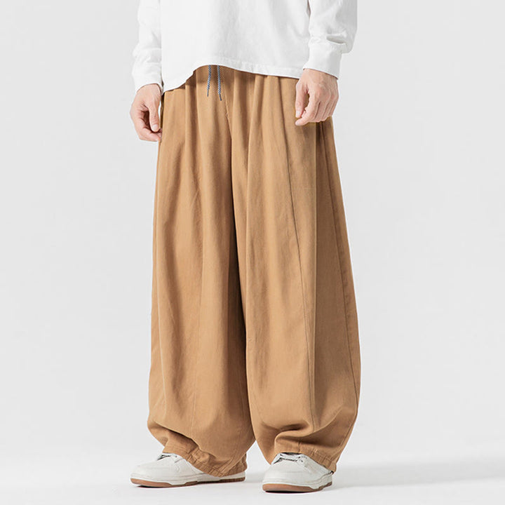 Pantalon en coton à jambes larges avec poches, motif Buddha Stones, idéal pour les trajets d'hiver. - image 11